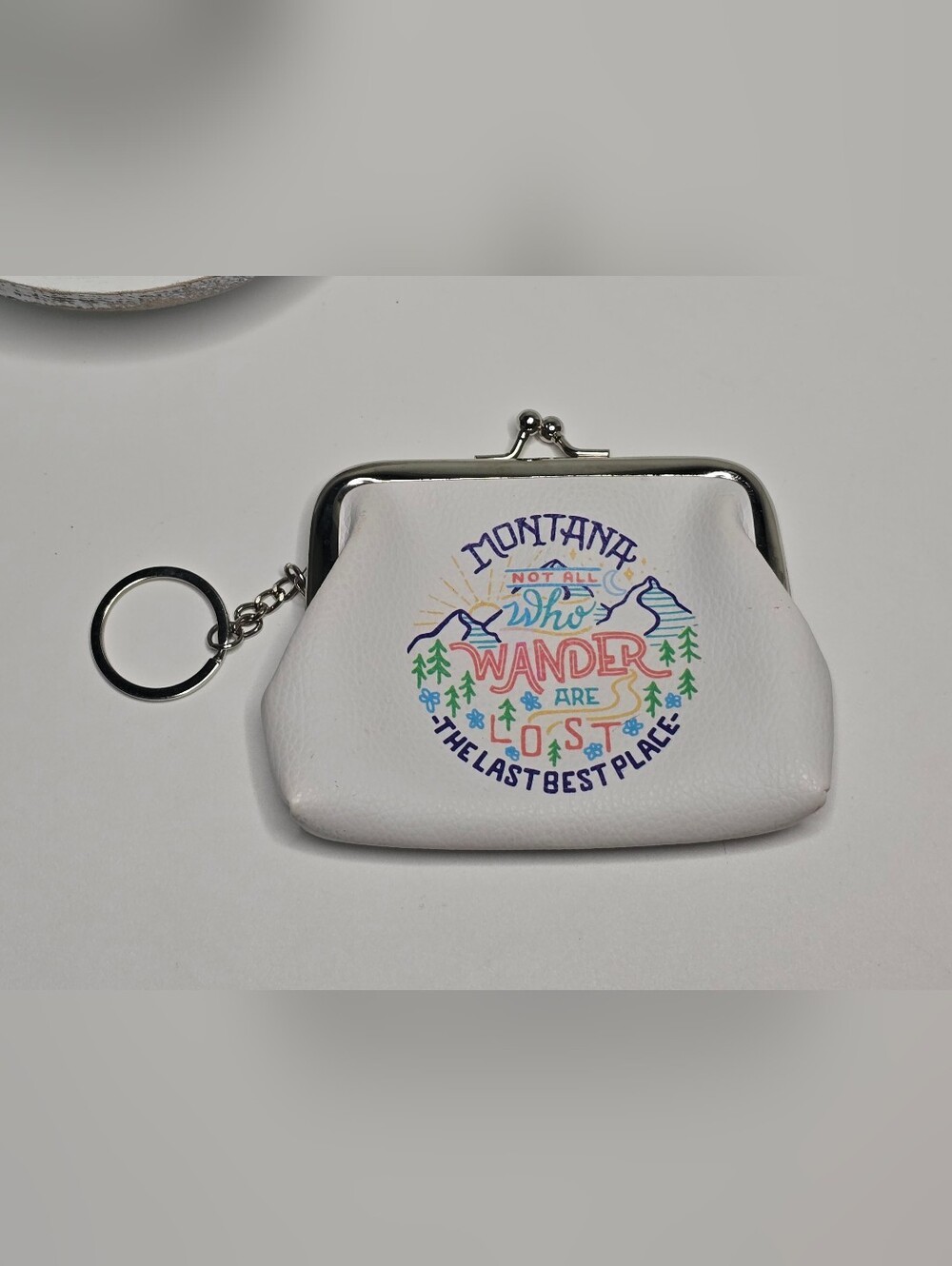 White Montana 'Not All Who Wander Are Lost' Coin Purse Keychain [ Read Details ]